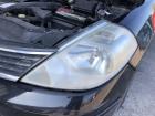 Nissan Tiida C11 Scheinwerfer links Frontscheinwerfer Halogen Lampe