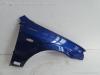 Mazda 323F BJ Kotflügel Fender Seitenwand vorn rechts blau ab 2000 Mazda 323F BJ Kotflügel Fender Seitenwand vorn rechts blau ab 2000